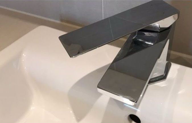 Sparkling clean chrome bathroom faucet
