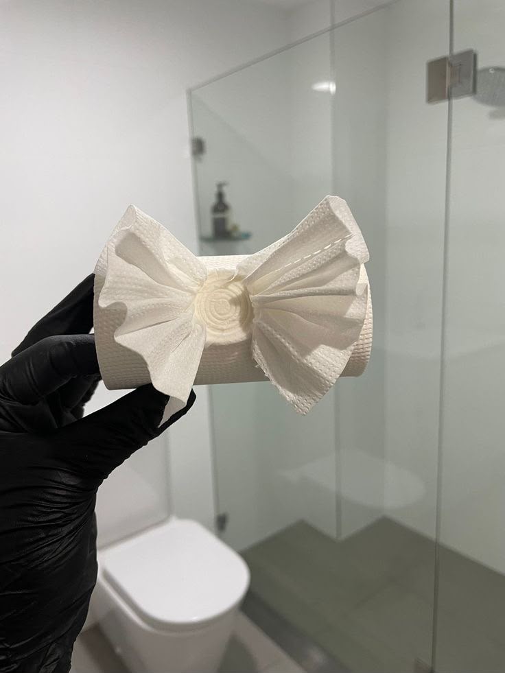 Decoratively folded towel finishing touch in a bathroom